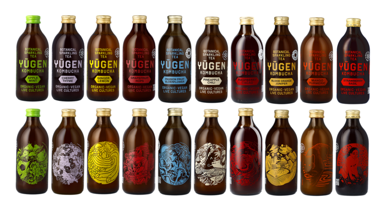 Variety of Yugen Kombucha bottles with illustrated labels, featuring flavors such as Apple Mint, Cherry Thyme, Ginger Lemon, Grapefruit Hops, Passion Fruit Elderflower, Pineapple Chili, Raspberry Cacao, Blood Orange Juniper, Mango Turmeric, and Strawberry Basil, all emphasizing organic and vegan qualities.